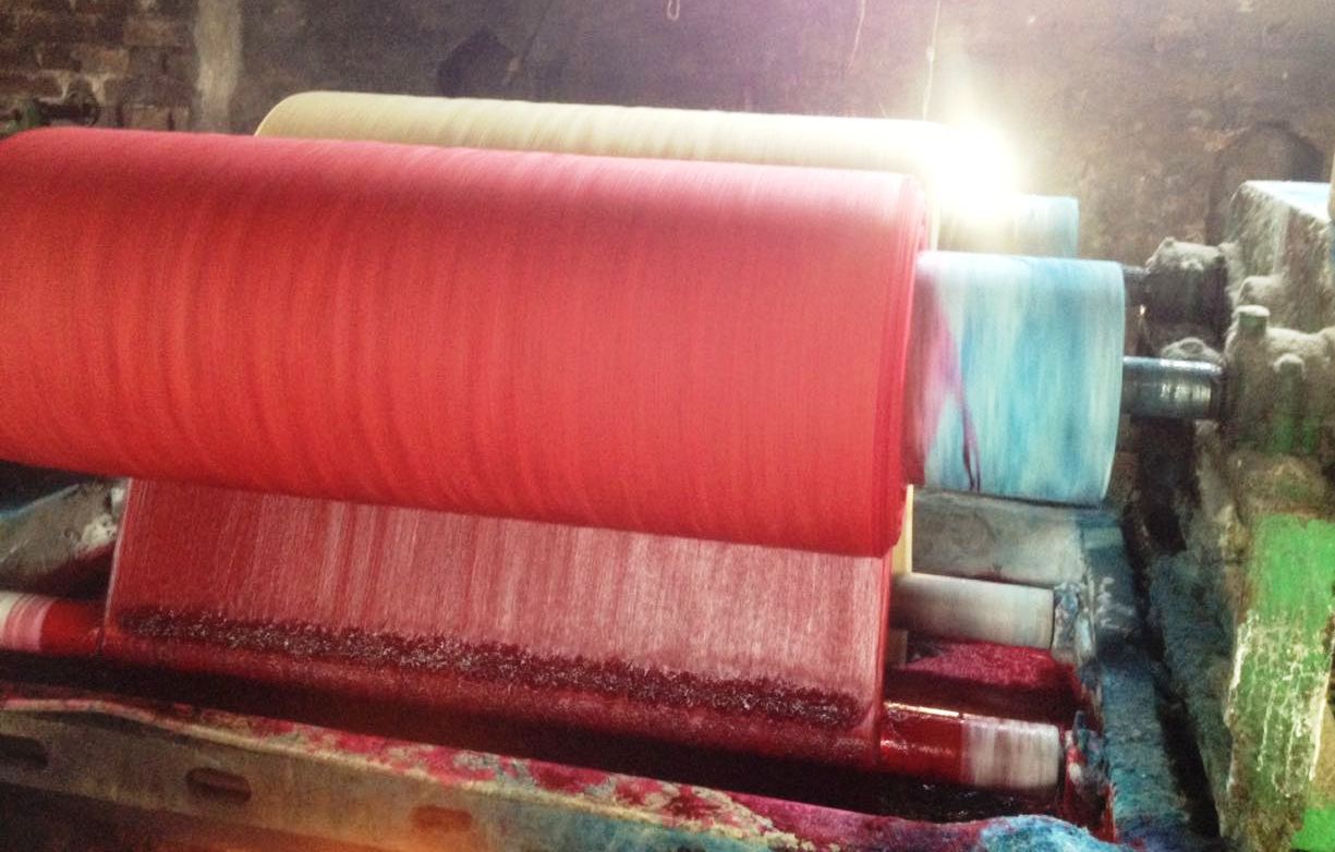 Eco-friendly fabric dyeing process using sustainable colors at Jucofabs facility
