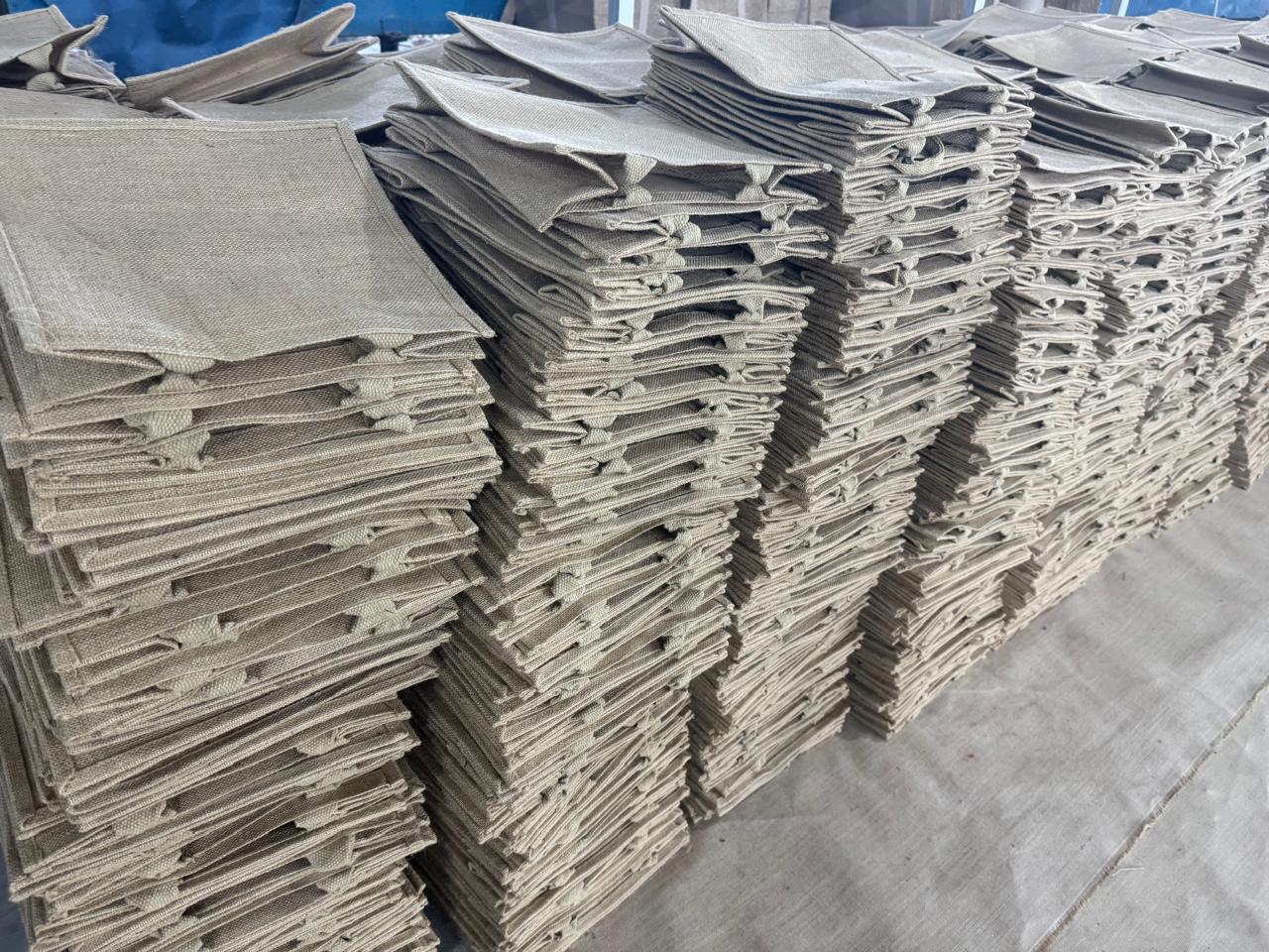 Completed sustainable jute and cotton bags ready for shipment to global customers